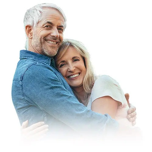 Older couple hugging | Katmai Eye and Vision Center
