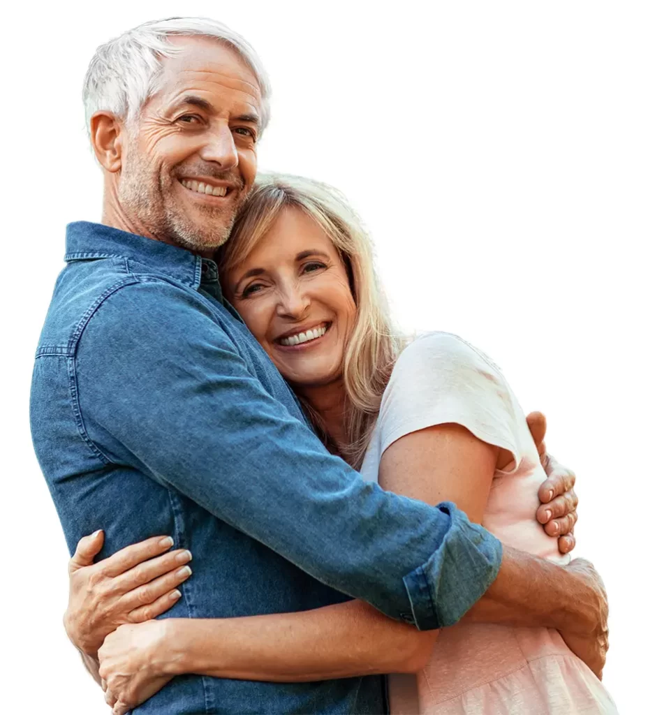 Older couple hugging | Katmai Eye and Vision Center